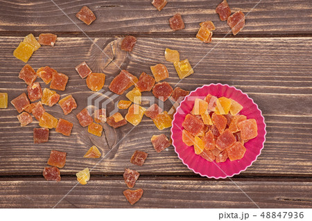 Dry papaya on brown wood 48847936