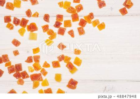 Dry papaya on grey wood Dry papaya on grey wood 48847948