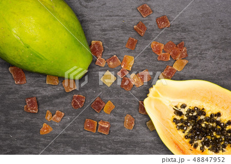Dry papaya on grey stone 48847952