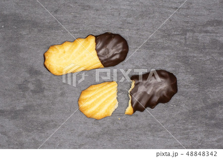 Lazy cookie with chocolate on grey stone Lazy cookie with chocolate on grey stone 48848342