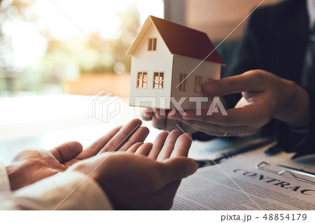 Real estate agent congratulations to new buyer by 48854179