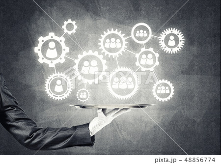 Waiter hand with white gloves holding silver plate full of social media communication icons 48856774