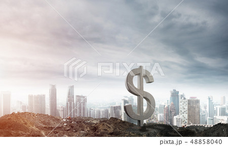 Money making and wealth concept presented by stone dollar symbol on natural landscape Money making and wealth concept presented by stone dollar symbol on natural landscape 48858040