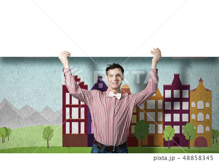 Cheerful man with banner Cheerful man with banner 48858345