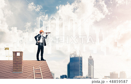 Engineer man standing on roof and looking in spyglass. Mixed med 48859587