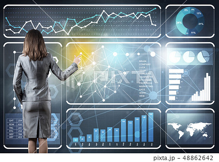 Businesswoman standing with back and pressing icon on media screen Businesswoman standing with back and pressing icon on media screen 48862642