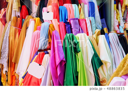 Satin has many colors. Fabric sale in stores. 48863835