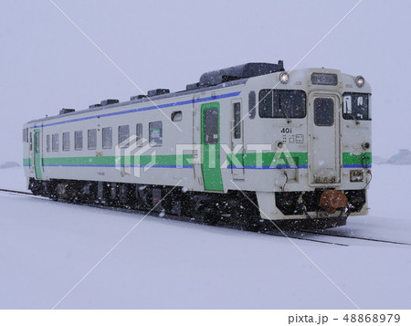 雪の空知路を駆ける新十津川発キハ40 48868979