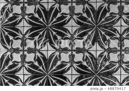 Decorative tiles (or azulejos) in a wall in the 48870417
