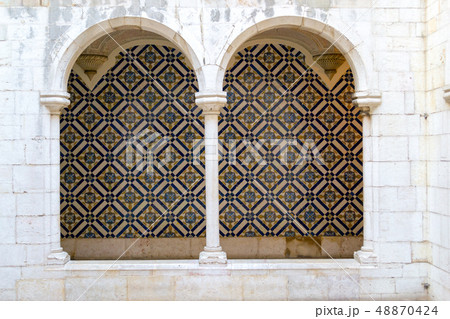 Decorative tiles (or azulejos) in a wall in the 48870424