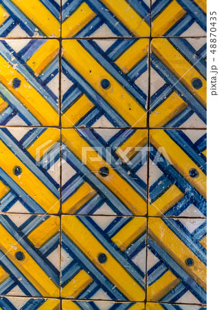 Decorative tiles (or azulejos) in a wall in the 48870435