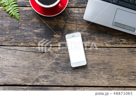 empty screen smart phone and computer on wooden  48871065