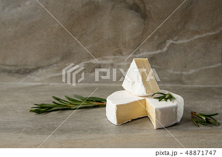 Cheese camembert or brie with fresh rosemary 48871747