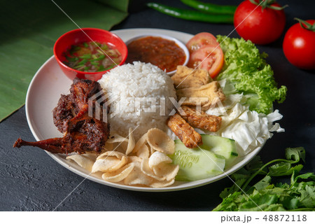 Nasi lemak kukus with quail meat 48872118