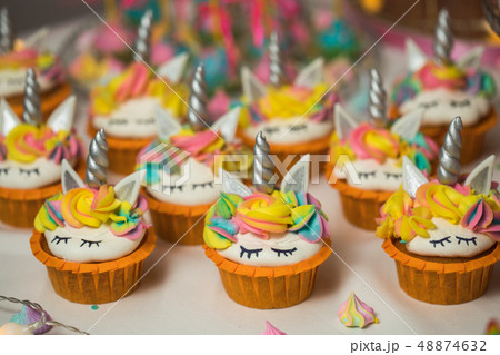 Delicious sweets on candy buffet. Lot of colorful desserts on table 48874632