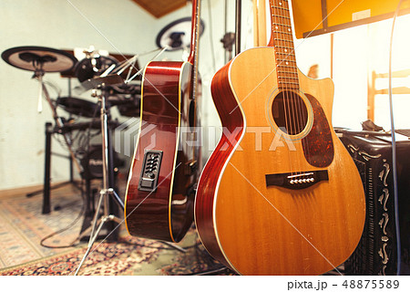 group home rehearsal room with guitars 48875589