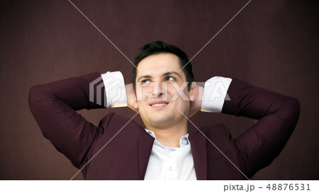 Successful young man in a suit. 48876531