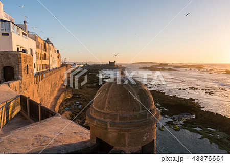 Sunset at the seaside view From Fort on Essaouira in Morocco on the Coast of Atlantic Ocean Sunset at the seaside view From Fort on Essaouira in Morocco on the Coast of Atlantic Ocean 48876664