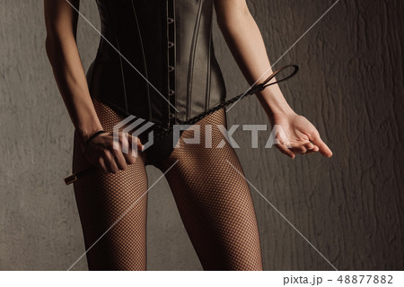 Sexy lady in bdsm outfit. Beauty dominant woman 48877882