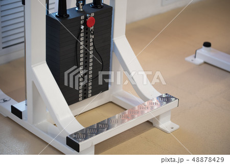 Close up weights of modern gym machine Close up weights of modern gym machine 48878429