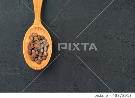 Fragrant pepper peas in a spoon 48878913