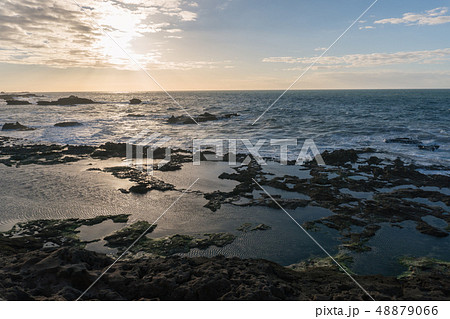 Sunset Over the Rocks of Atlantic Ocean in Morocco at Low Tide 48879066