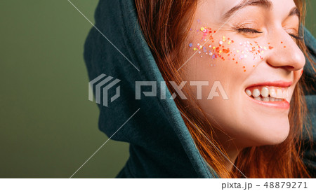 woman emotion smiling eyes closed glitter freckles woman emotion smiling eyes closed glitter freckles 48879271