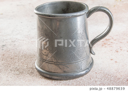 Vintage pewter beer mug closse up Vintage pewter beer mug closse up 48879639