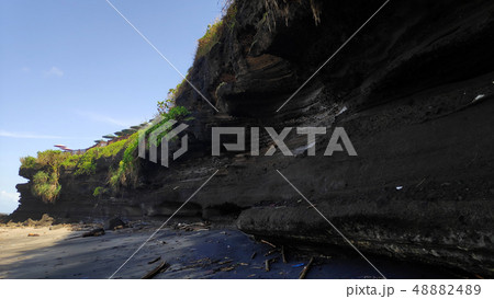 Cliff near Tanah Lot Temple in Bali Cliff near Tanah Lot Temple in Bali 48882489