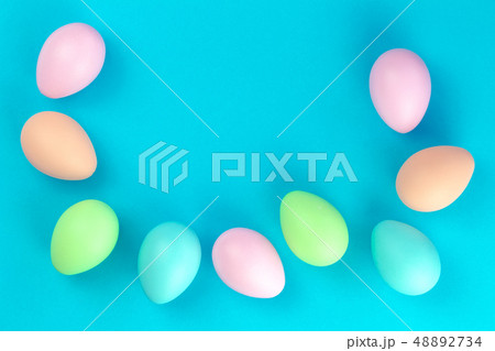 Colorful pastel easter eggs on blue Colorful pastel easter eggs on blue 48892734