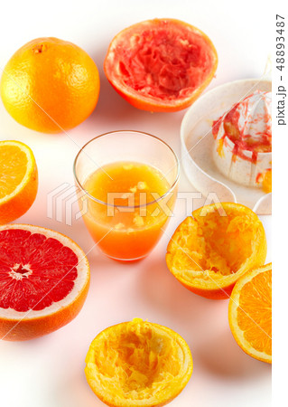 freshly squeezed citrus juice. Orange and grapefruit freshly squeezed citrus juice. Orange and grapefruit 48893487