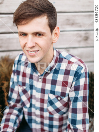 Portrait of man closeup of handsome guy smiling 48894720