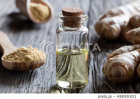 A bottle of ginger essential oil A bottle of ginger essential oil 48899301