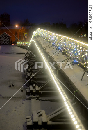 Kronverksky bridge at winter evening. Kronverksky bridge at winter evening. 48899381
