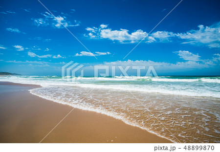 Yellow sand beach, sea and deep blue sky. 48899870