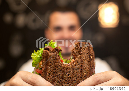 Closeup funny blurred protrait of young man hold Closeup funny blurred protrait of young man hold 48901342