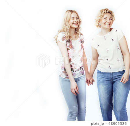 mother with teen daughter together posing happy smiling isolated on white background with copyspace mother with teen daughter together posing happy smiling isolated on white background with copyspace 48903526
