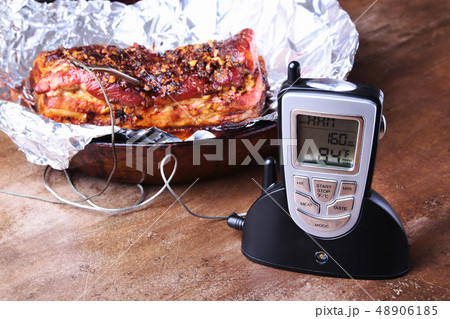 Grilled Steak in a pan and Wireless Remote Digital Cooking Food Probe Meat Thermometer For Grill on 48906185