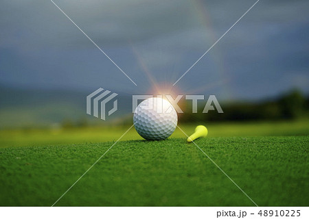 Golf ball and golf club in beautiful golf course Golf ball and golf club in beautiful golf course 48910225