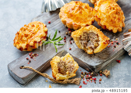 Homemade mini-pies with meat filling. 48915195