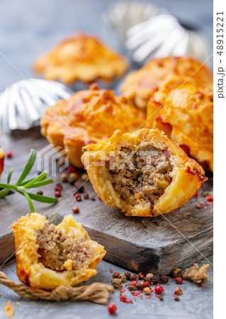 Homemade mini-pies with meat filling. 48915221