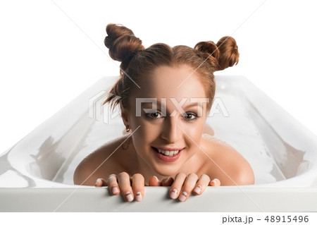 Pretty nude girl in foam bath isolated view Pretty nude girl in foam bath isolated view 48915496