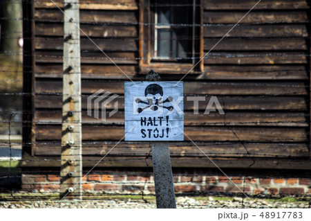 Auschwitz, Poland - March 12, 2019 Stop death sign at the Auschwitz Birkenau concentration camp Auschwitz, Poland - March 12, 2019 Stop death sign at the Auschwitz Birkenau concentration camp 48917783