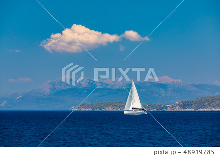 Lonely yacht sailing on silent sea. Turkey. Lonely yacht sailing on silent sea. Turkey. 48919785