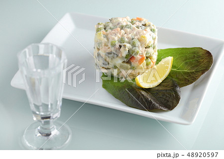 Russian salad with pink salmon and vegetables 48920597