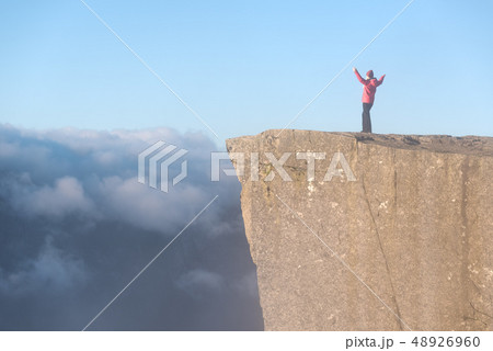 Girl on the Rock Preikestolen, Norway Girl on the Rock Preikestolen, Norway 48926960