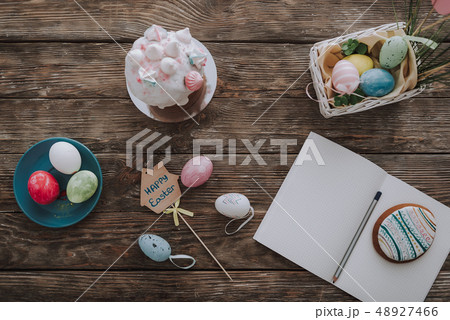 Easter bakery and decoration on wooden table Easter bakery and decoration on wooden table 48927466