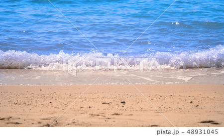 Clear light blue color sea water splashing to 48931045