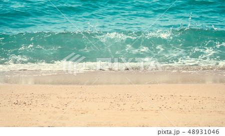 Clear light blue color sea water splashing to 48931046