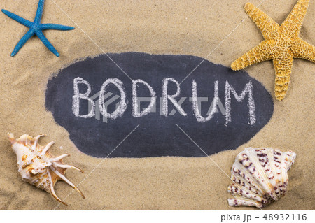 Handwritten word BODRUM written in chalk, among 48932116